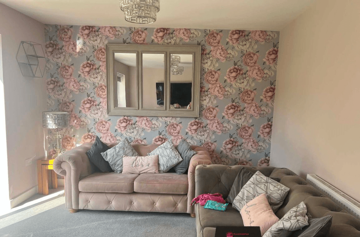 Floral feature wallpaper in living room